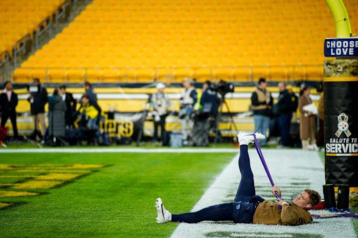 Tennessee Titans quarterback Will Levis (8) stretches before a game against the Pittsburgh Steelers.